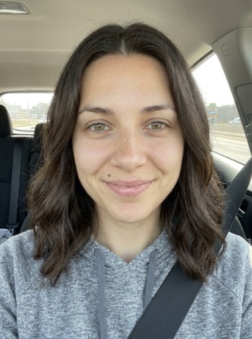 Car selfie of Mia with a seatbelt on